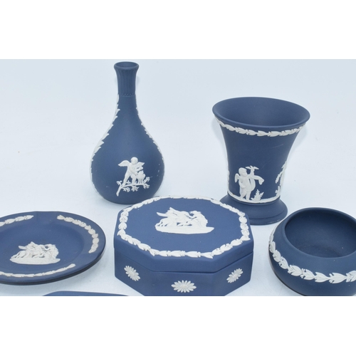 88K - Wedgwood Jasperware in Cobalt Blue: to include octagonal trays, a trinekt, vases and others (7).