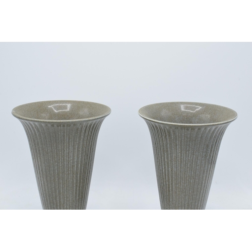 89 - A pair of Wedgwood ribbed trumpet vases in a speckled grey glaze, impressed and printed marks to bas... 