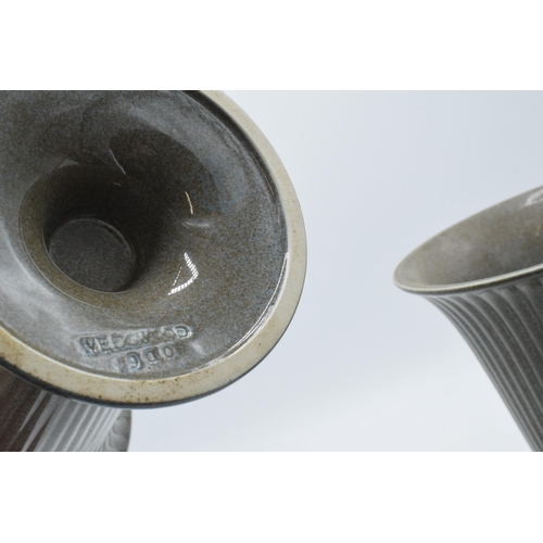 89 - A pair of Wedgwood ribbed trumpet vases in a speckled grey glaze, impressed and printed marks to bas... 