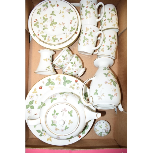 158 - A large collection of Wedgwood Wild Strawberry tea and dinner ware to include a teapot, a coffee pot... 