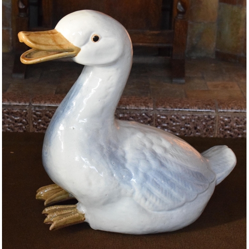 327A - Early to mid 20th century large majolica figure of a goose, 43cm tall.