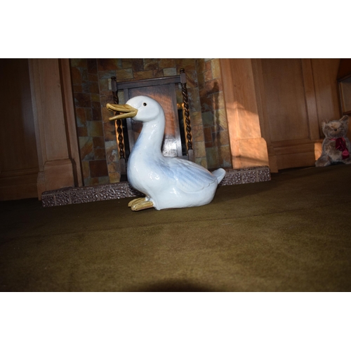 327A - Early to mid 20th century large majolica figure of a goose, 43cm tall.