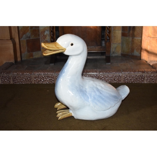 327A - Early to mid 20th century large majolica figure of a goose, 43cm tall.