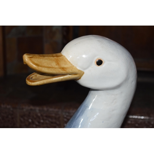 327A - Early to mid 20th century large majolica figure of a goose, 43cm tall.