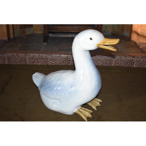 327A - Early to mid 20th century large majolica figure of a goose, 43cm tall.