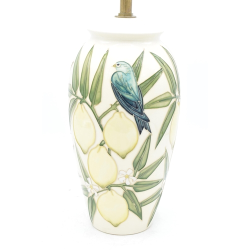 101A - Moorcroft lamp base in the Lemon and Bird pattern, together with a Moorcroft lamp shade, 26.5cm tall... 