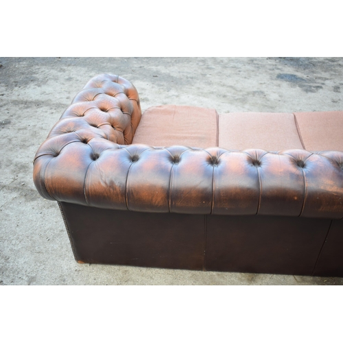 403 - Brown leather deep buttoned Chesterfield three seater sofa with metal beading, 192x98x65cm tall, cus... 