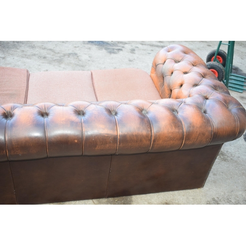 403 - Brown leather deep buttoned Chesterfield three seater sofa with metal beading, 192x98x65cm tall, cus... 