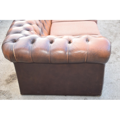 403 - Brown leather deep buttoned Chesterfield three seater sofa with metal beading, 192x98x65cm tall, cus... 