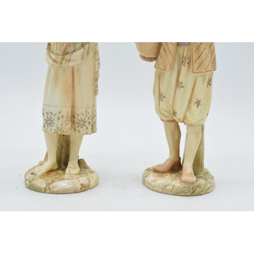 43A - A pair of Royal Worcester blushed ivory male and female water carriers, '1206' impressed to base', d... 