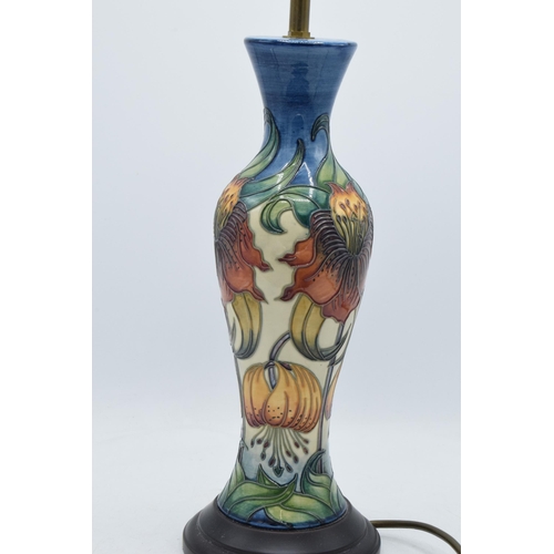 102A - Moorcroft lamp base in the Anna Lily design, 34cm tall exc. fitting.