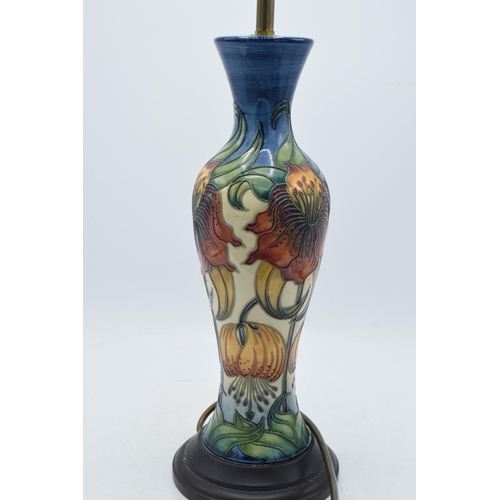 102A - Moorcroft lamp base in the Anna Lily design, 34cm tall exc. fitting.