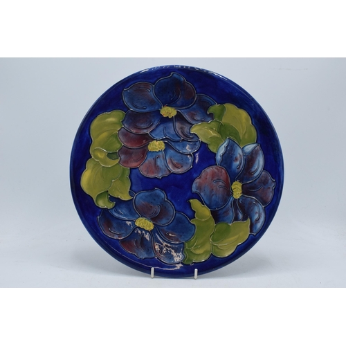 102E - Large Moorcroft Hibiscus on blue charger / gateau plate, 31cm diameter.