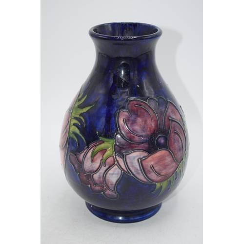 102I - Moorcroft large floral vase on blue backgound, 19cm tall.