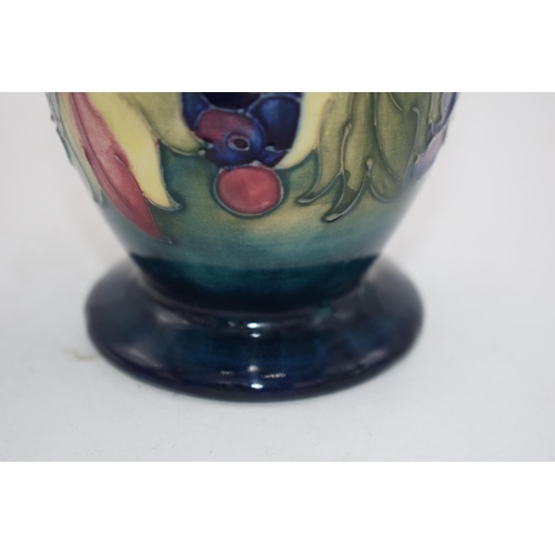 102J - Moorcroft Leaf and Berry baluster vase, 11cm tall (possible restoration).