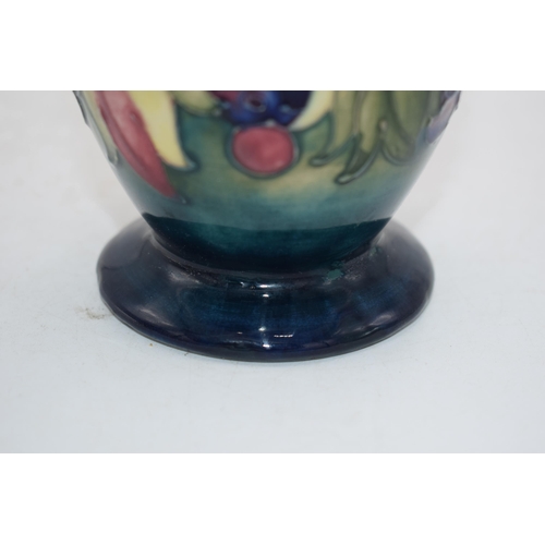 102J - Moorcroft Leaf and Berry baluster vase, 11cm tall (possible restoration).