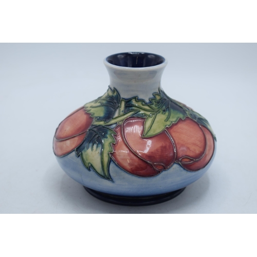 102L - Moorcroft squat vase decorated with plums, 10cm tall.