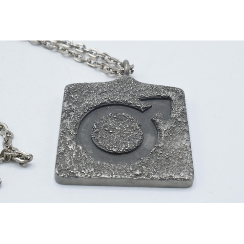 180I - Jorgen Jensen pewter pendant, marked 'Jorgen Jensen Denmark 299' on white metal chain, 4.5cm diamete... 