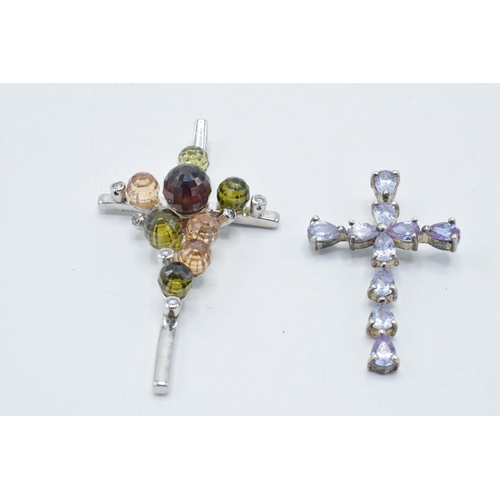 180J - A pair of silver stone set cross pendants (2), 6cm longest.