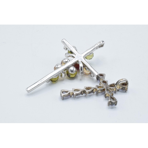 180J - A pair of silver stone set cross pendants (2), 6cm longest.