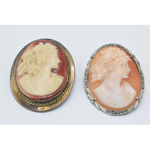 180L - A pair of silver framed cameo brooches, one with marcasites (2).