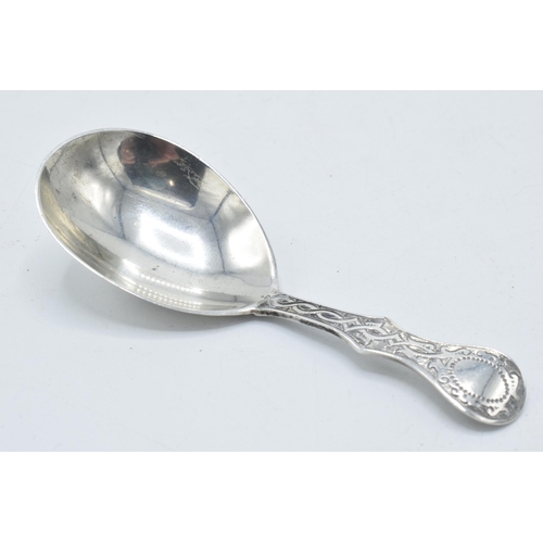 180R - Victorian silver caddy spoon, London 1862, design to rear, 13.1 grams, 9cm long.