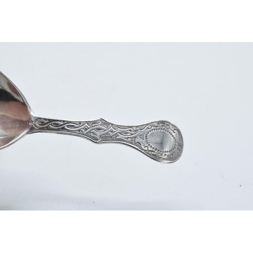 180R - Victorian silver caddy spoon, London 1862, design to rear, 13.1 grams, 9cm long.