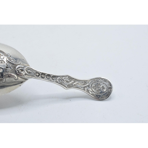 180R - Victorian silver caddy spoon, London 1862, design to rear, 13.1 grams, 9cm long.