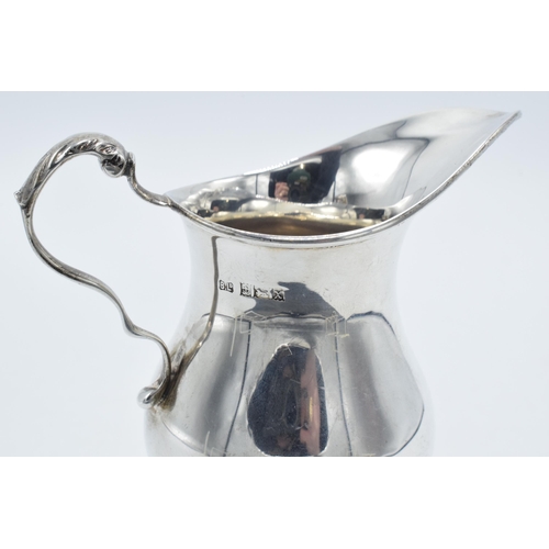 180S - Silver pedestal jug, Birmingham 1972, 107.7 grams, 13cm tall.