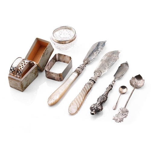 105 - A collection of silver items to include a pair of silver and Mother of Pearl handled fish knives, Bi... 