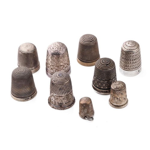 112 - A collection of silver thimbles to include examples by Charles Horner and others (9), 37.4 grams.