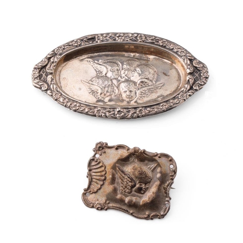 116 - A pair of silver items in the Reynold's Angel pattern to include a small oval pin tray, Birmingham 1... 