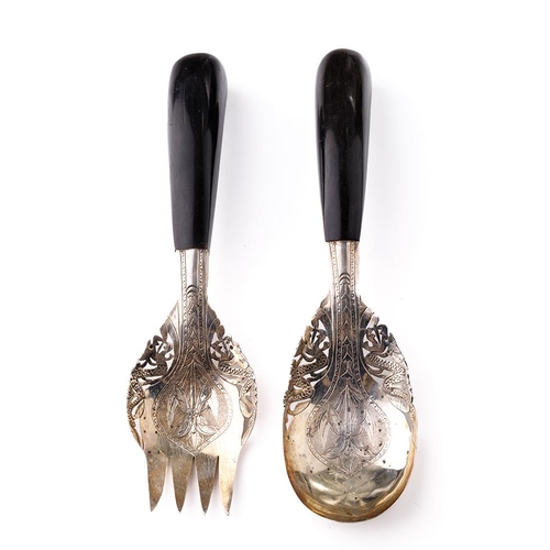 124 - A pair of early to mid 20th century lower grade silver salad servers with ebonised wooden handles, M... 