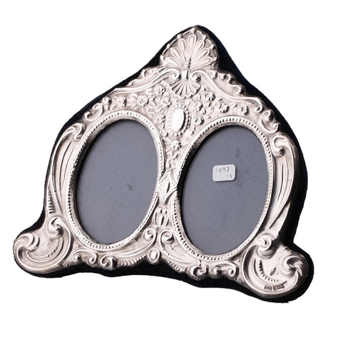 133 - Hallmarked silver fronted double photo frame, 18cm wide, Birmingham 1995.