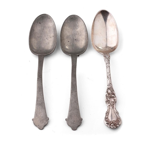 140 - A pair of antique pewter serving spoons together with a silver plated example (3).