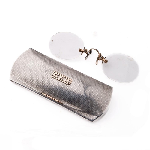 147 - Silver engine turned spectacle case with gold inlay, Chester 1919, containing a later pair of specta... 