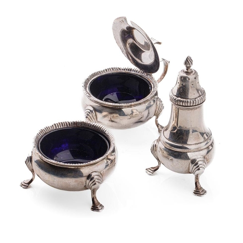 153 - 3-piece silver cruet set to include pepper pot, mustard and salt cellar with blue glass liners, 257.... 