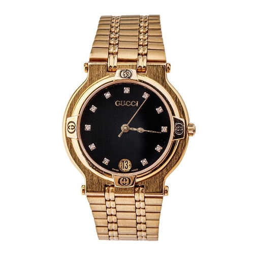 242 - Boxed gold plated Gucci quartz wristwatch, black dial set with diamonds and calendar, model no. 9200... 