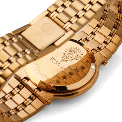 242 - Boxed gold plated Gucci quartz wristwatch, black dial set with diamonds and calendar, model no. 9200... 