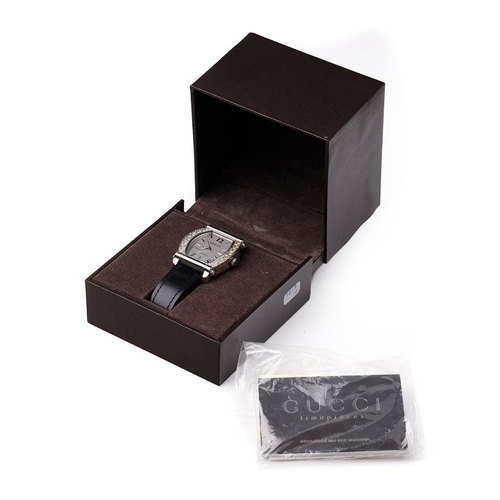 243 - Boxed Gucci ladies quartz watch, with paperwork.