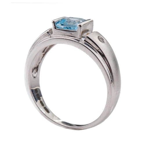 268 - 9ct white gold ladies ring set with two diamonds and aqua-marine, 3.2 grams, size N, with raised sho... 