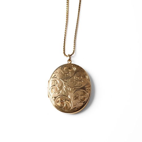 303 - 9ct gold engraved oval locket on a 9ct gold S-link chain, 20.0 grams, chain 59cm long.