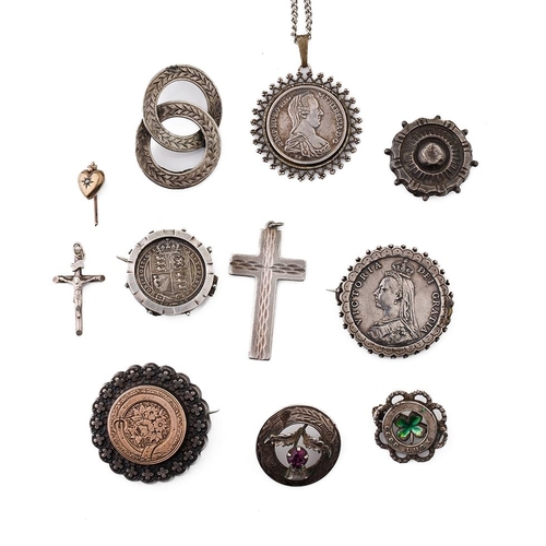 330 - A collection of silver and silver coloured jewellery to include Victorian coin brooches, a cross pen... 