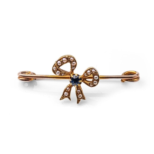 340 - 9ct gold brooch with bow, set with a sapphire and pearls, 2.3 grams, 3.5cm wide.