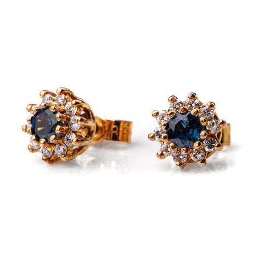 342 - 9ct gold pair of earrings set with diamonds and sapphires, 1.8 grams.