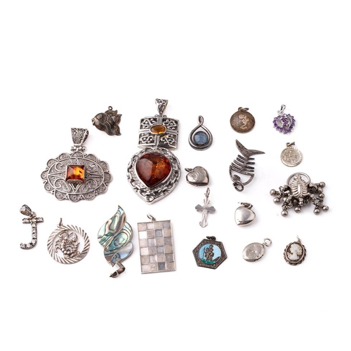 385 - An interesting collection of silver pendants and charms to include a fish, small hearts, fob-style i... 