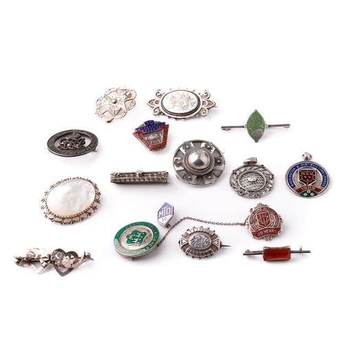 391 - An interesting collection of silver jewellery to include enamelled fobs, Victorian brooches, pendant... 