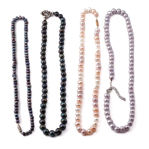 416 - A collection of 4 faux pearl necklaces of varying colours (4).