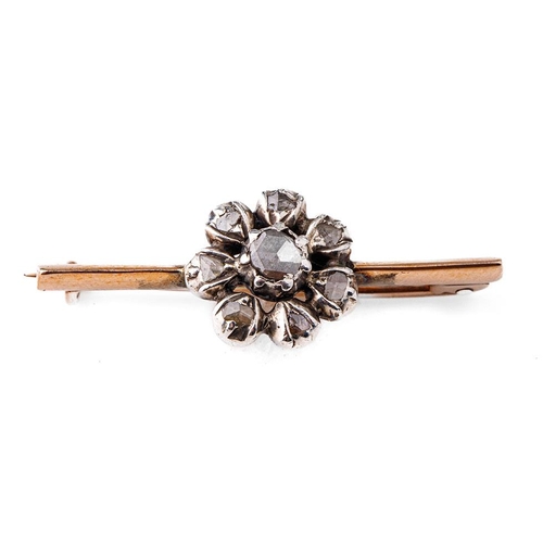 420 - Victorian 9ct gold bar brooch set with old cut diamonds in the form of a flower, 3.9 grams, 34mm wid... 