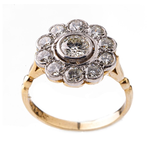 18ct gold and platinum 11 stone diamond ring, circa  2.2-2.6ct of diamonds, 5.2 grams, size Q.